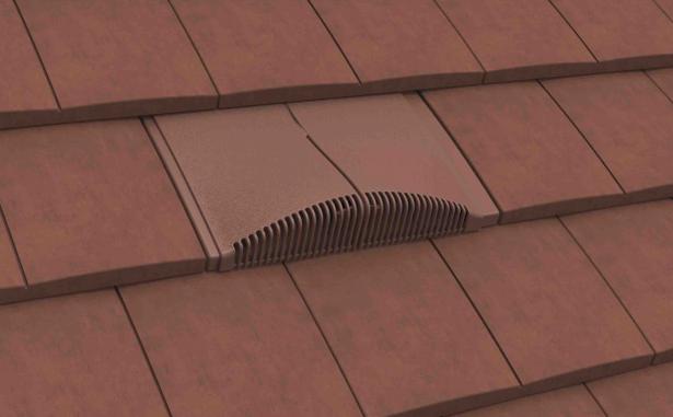 Antique Red interlocking plain tile vent installed on a tiled roof